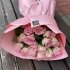 Монобукет із 15 рожевих троянд, що зібрані по спіралі в стильному рожевому упакуванні. _1